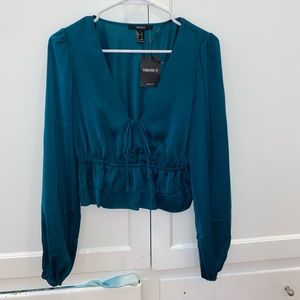 Teal peplum long sleeve top